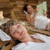 Spa room woman relax on wooden chair