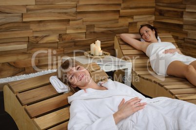 Wellness treatment woman relax on wooden chair