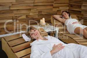 Wellness treatment woman relax on wooden chair