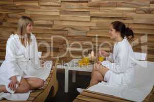 Spa treatment two woman in bathrobe