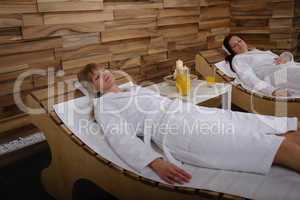 Spa room two women relax after treatment