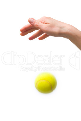 hand and tennis ball