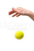 hand and tennis ball