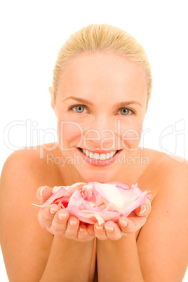 Woman with rose petals in her hand