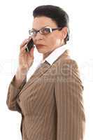 Geschäftsfrau mit Brille beim telefonieren