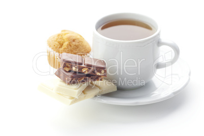 bar of chocolate,tea and muffin isolated on white