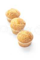 three  muffins  isolated on white