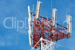 antenna on a background of blue sky with clouds