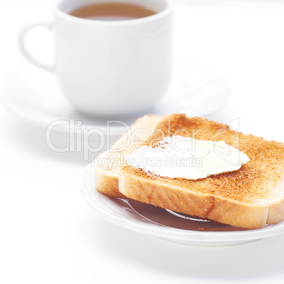 tea and toast with butter isolated on white