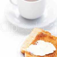 tea and toast with butter isolated on white