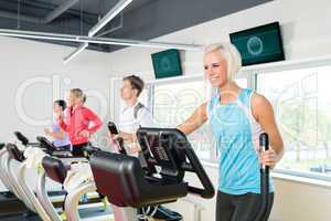 Young people on fitness treadmill running exercise