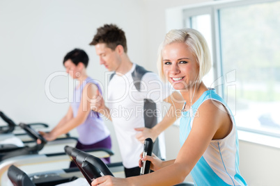 Fitness young people on treadmill running exercise