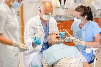 Senior man at dentist surgery have operation