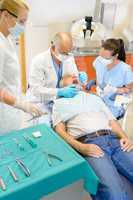 Senior man at dentist surgery have operation