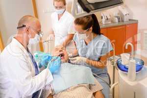 Senior man at dentist surgery have treatment