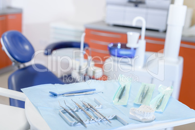 Dental tools on table in stomatology clinic