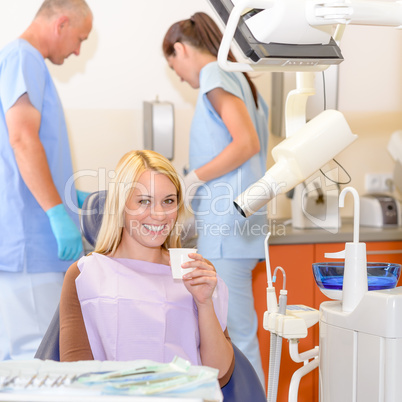 Smiling patient at dentist surgery