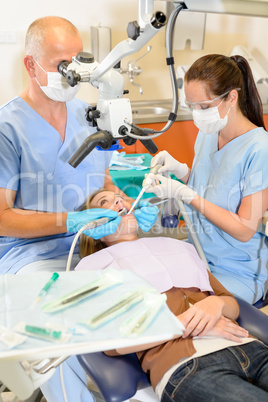 Woman at dentist surgery have treatment