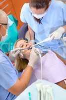Woman at dentist surgery have treatment