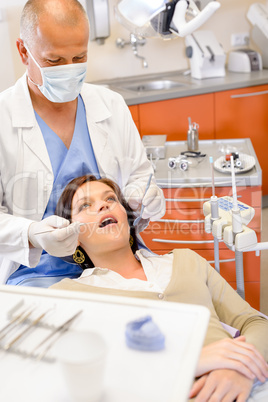 Woman patient at dental hygienist surgery