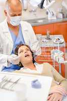 Woman patient at dental hygienist surgery