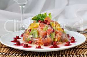 Fruit salad with salmon and pomegranate