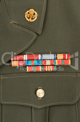 Military awards and decorations on green uniform