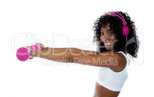 Teenager listening to music and exercising
