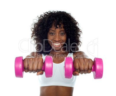 Portrait of curly haired african fit woman