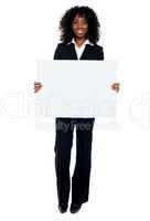 Business lady promoting big blank banner ad