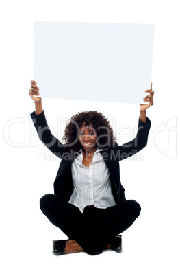 Female executive with whiteboard over her head