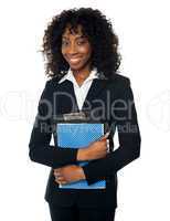 Smiling confident female executive