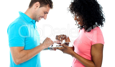 Couple using wireless touch pad device