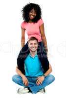 Girlfriend riding on her mans shoulder