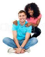 Love couple sitting on floor