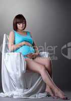 Pretty pregnant young woman