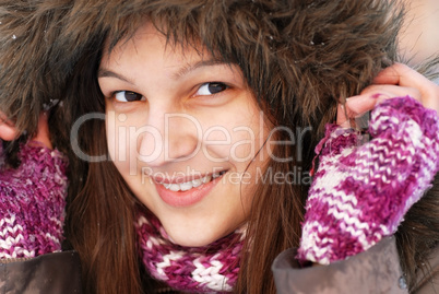 Smiling girl in hood