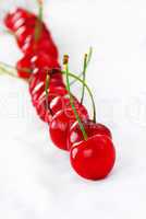 Appetizing red cherries row