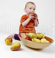 baby with apples and pears