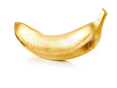 Golden banana isolated on white background.