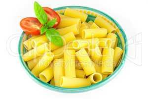 Bowl full of rigatoni pasta with tomatoes and basil