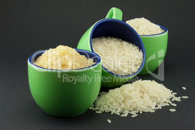 Three varieties of rice in three small green cups