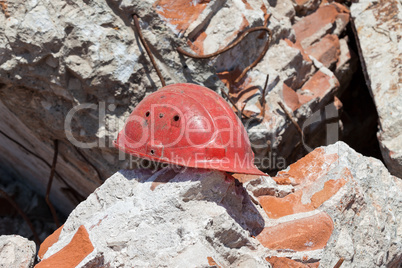 Old construction helmet over ruins