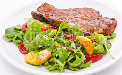 cervical chop with apricot-rocket salad