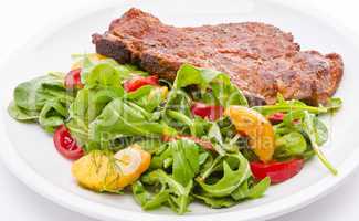 cervical chop with apricot-rocket salad