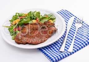 cervical chop with apricot-rocket salad