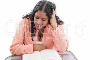 High school or college ethnic African-American female student sitting by the desk