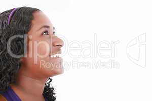 Happy african girl looking up, isolated on white