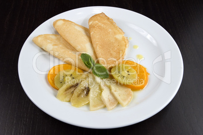 Pancakes with fruit.