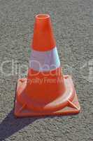 Cone on a road.